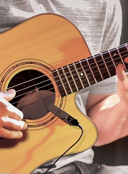 open zoom image for Audio-Technica AT831R Cardioid Condenser Lavalier Microphone with AT8533 Power Module, AT831R, with TA3F connector and guitar mount, AT8444 Guitar Mount In Use