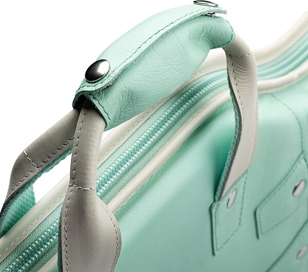 open zoom image for Levy's Chroma Leather Electric Guitar Bag, Aqua Green, Action Position Back