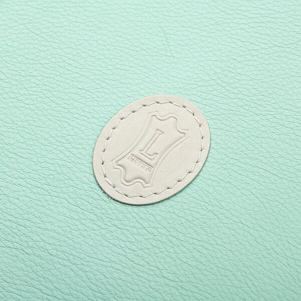 open zoom image for Levy's Chroma Leather Electric Guitar Bag, Aqua Green, Action Position Back