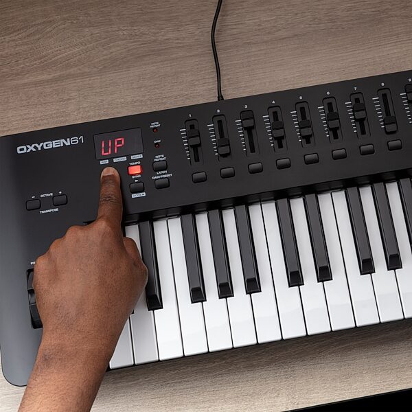open zoom image for M-Audio Oxygen 61 MKV USB MIDI Controller, 61-Key, New, Action Position Back