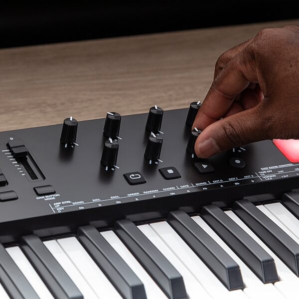 open zoom image for M-Audio Oxygen 61 MKV USB MIDI Controller, 61-Key, New, Action Position Back