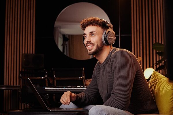 open zoom image for Beyerdynamic DT 990 PRO 250-Ohm Open-Back Headphones, Original Black with Gray Earpads, includes 3-meter coiled cable, In Use