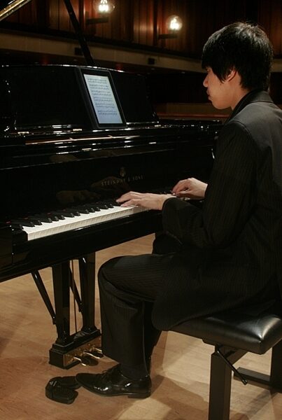 open zoom image for Page Flip Cicada Wireless Sheet Music Turner Bluetooth Pedal, In Use 1