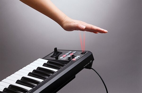 open zoom image for Roland A-49 USB MIDI Keyboard Controller, 49-Key, Black, Black with Handbeam in use