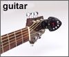 open zoom image for Seiko STX1 Guitar and Bass Clip-on Tuner, On Guitar