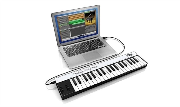 open zoom image for IK Multimedia iRig KEYS Mini Keyboard Controller, 37-Key, In Use with iBook