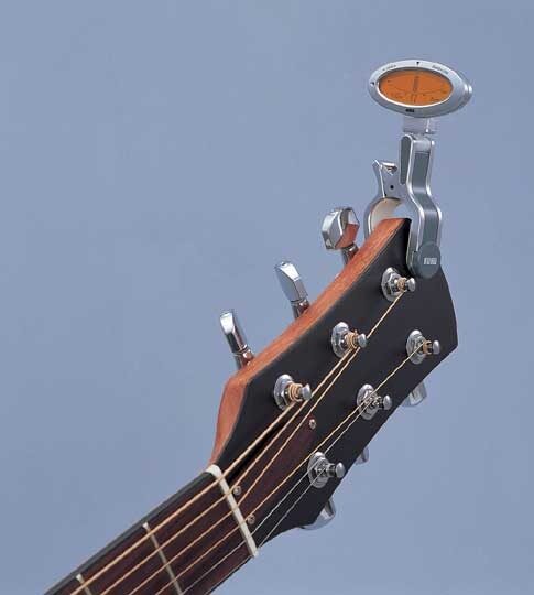 open zoom image for Korg AW1 Acoustic and Wind Clip-On Tuner, On Guitar