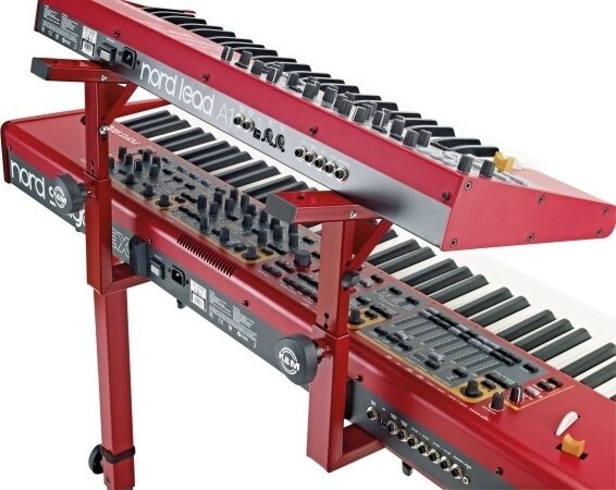 K&M 18810 Omega Keyboard Stand, Red, with 2nd Tier, In Use