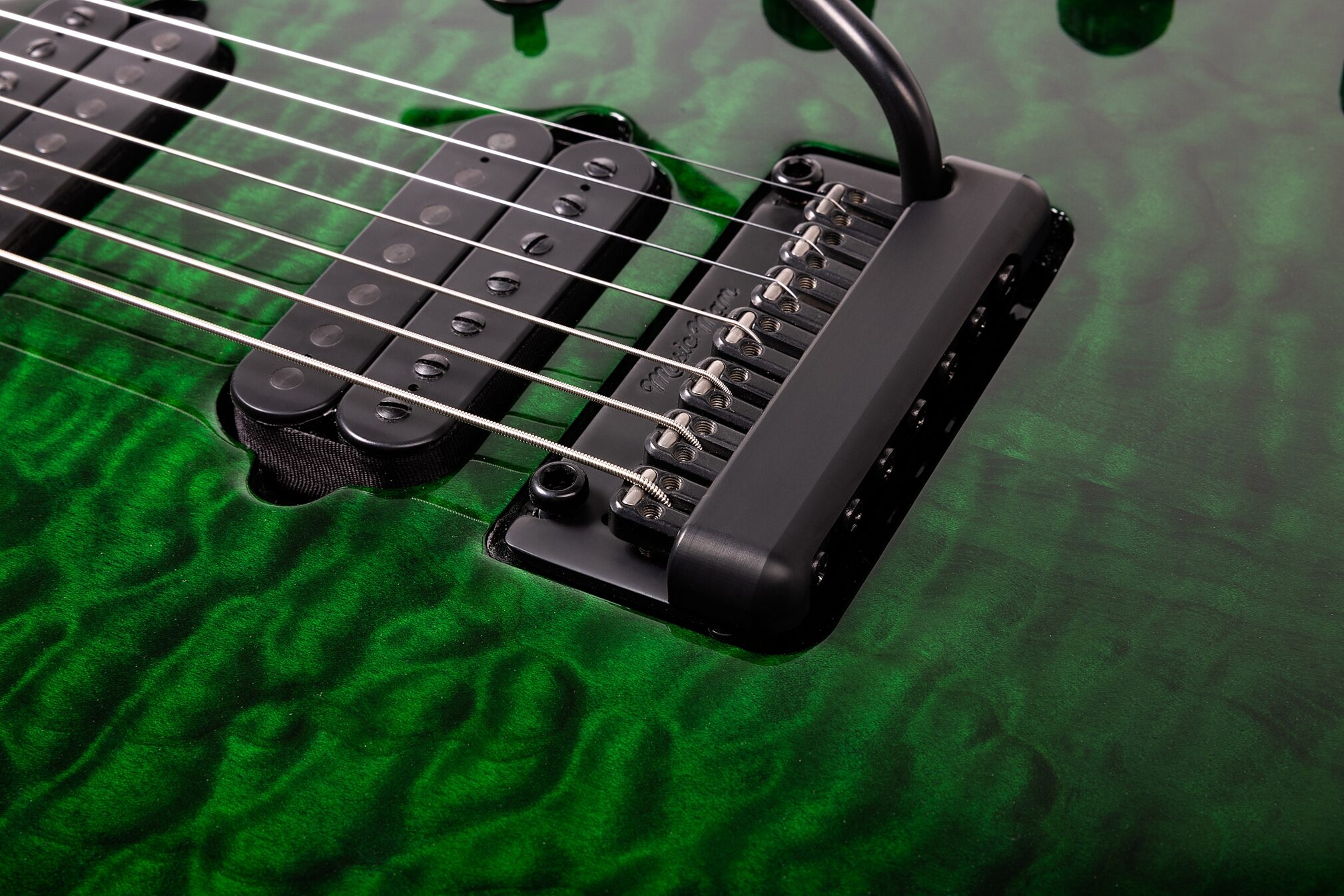 Ernie Ball Music Man John Petrucci JP15 7 Electric Guitar, 7-String (with Case), Green Tiger Eye Quilt, Action Position Back