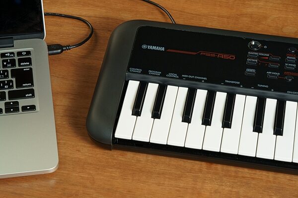 Yamaha PSS-A50 Mini Keyboard, Action Position Side