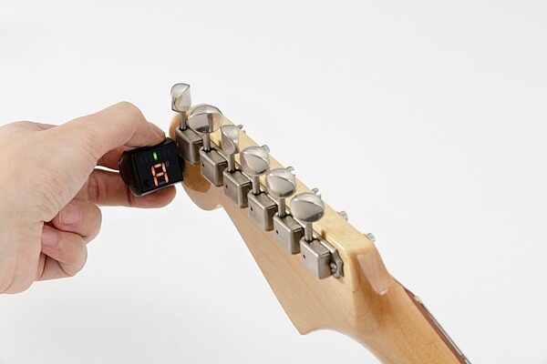 Korg GripTune ClipOn Guitar Tuner, In Use