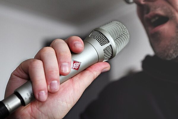 Neumann KMS 105 Handheld Supercardioid Condenser Microphone, Nickel, In Use